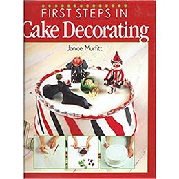 First Steps in Cake Decorating: Over 100 Step-by-step Cake Decorating Techniques and Recipes by Janice Murfit- Hardcover